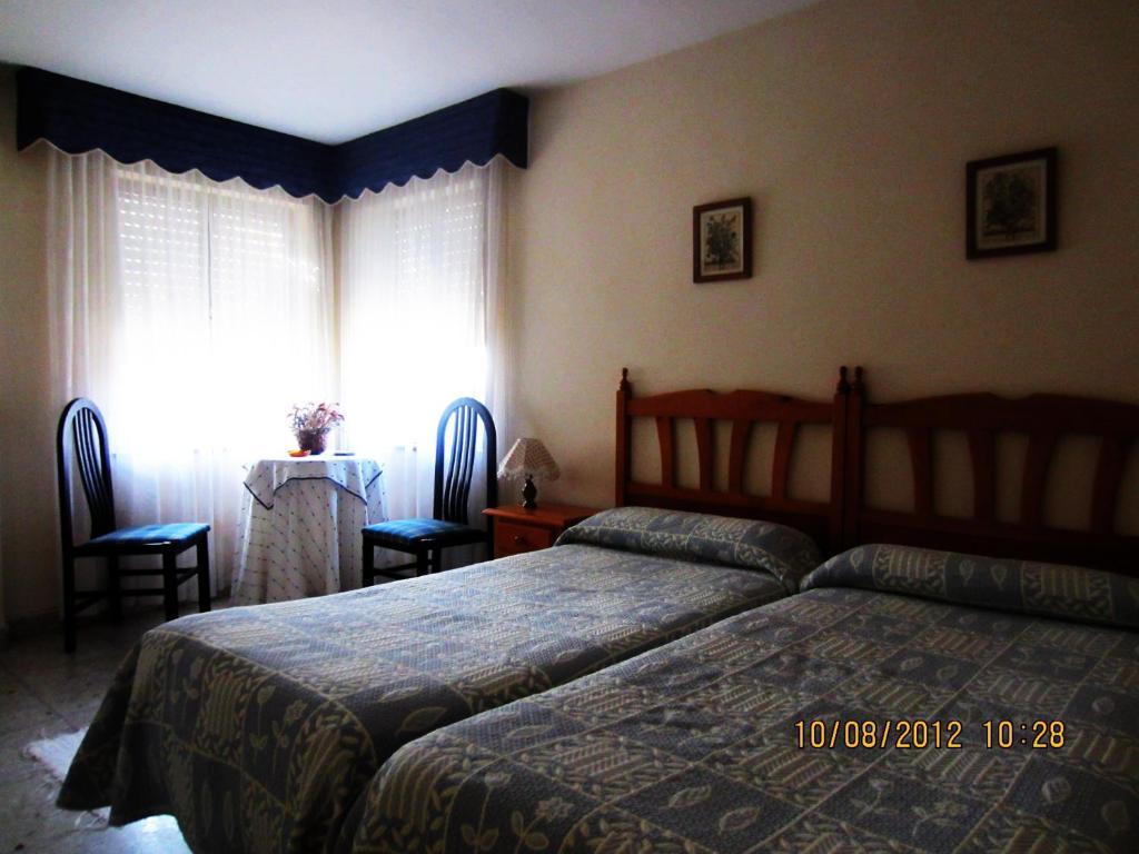 Hostal Toscana Ojedo Habitación foto